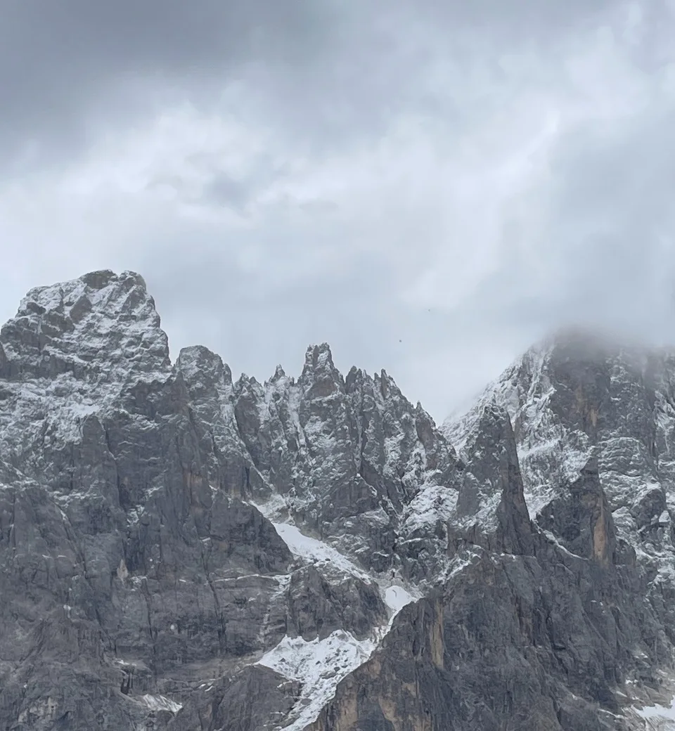 The Pale di San Martino under low cloud, first snow on the rock